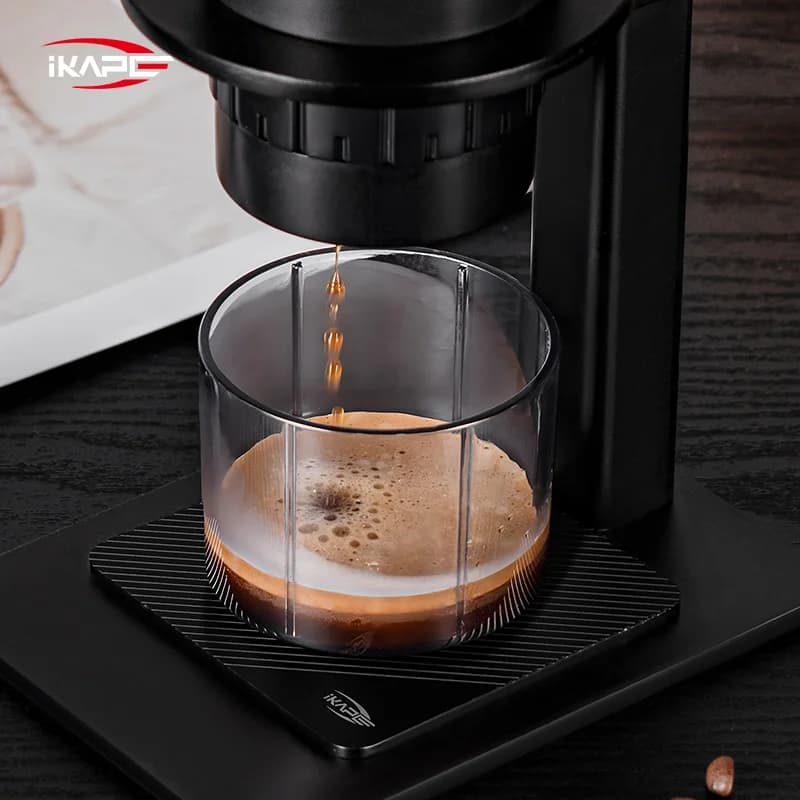 Máy pha cà phê cầm tay dùng viên nén và cà phê xay